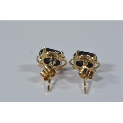 163 - Two pairs of 9ct gold & gem set ear studs, gross weight 1.8 grams