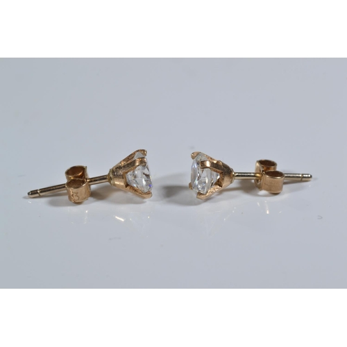 166 - Two pairs of 9ct gold & white stone ear studs