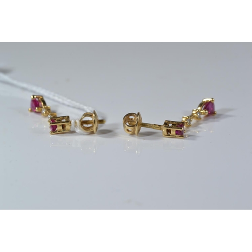 174 - Pair of 18ct gold, diamond & red stone earrings, length 24mm, gross weight 4.13 grams