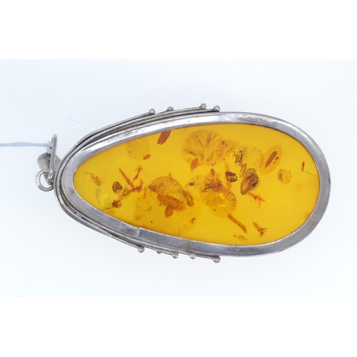 195 - Large silver & amber pendant, length including bale 87mm, 30 grams