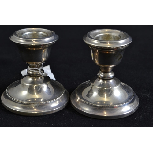 231 - Pair of silver candlesticks, maker SJR, Birmingham 1969, height 6.8cm, weighted, gross weight 193.34... 