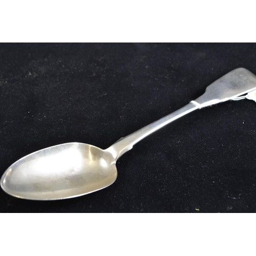 238 - William IV Irish silver serving spoon, maker's mark TM, Dublin 1833, the terminal with a crest, leng... 