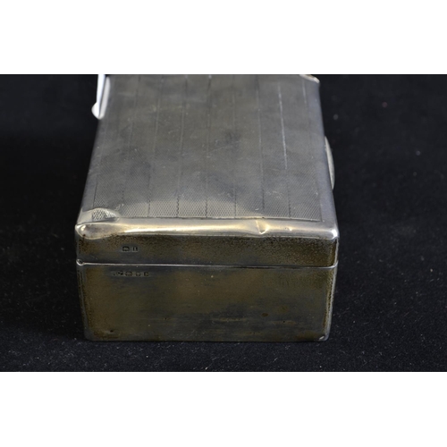 245 - Rectangular silver cigarette box, maker's mark rubbed, London 1926, wood lined, 11.5cm wide, gross w... 