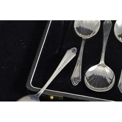 254 - Cased set of six silver dessert spoons, maker P. Bros, Birmingham 1936, gross weight 152 grams