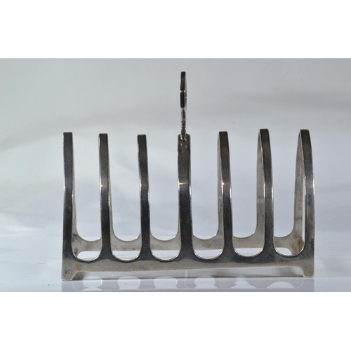 259 - Pair of silver toast racks, maker OT & BD, London 1925 & 1927 respectively, width 11.2cm, gr... 