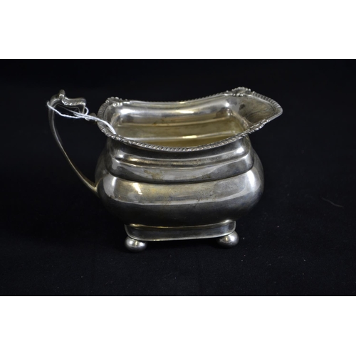 261 - Silver milk jug, maker's mark rubbed, Sheffield 1961, 15cm wide, 268 grams