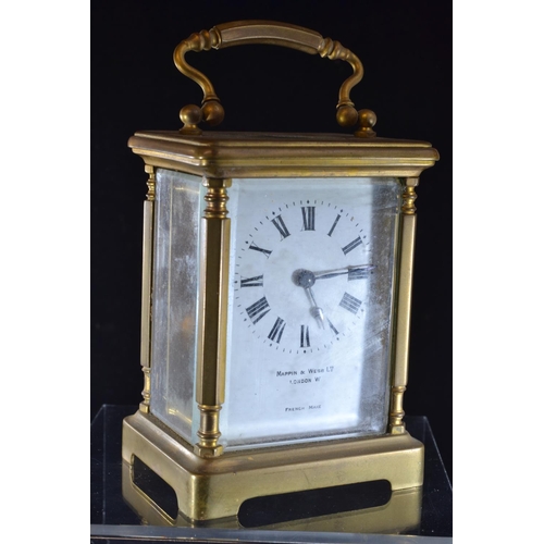 384 - French brass cased carriage clock, retailed by Mappin & Webb, with key, height inc. handle 14.5c... 