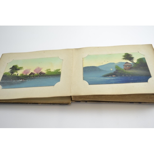 420 - Early C20th Japanese lacquered album containing postcards of Japan, inc. silk printed and hand paint... 