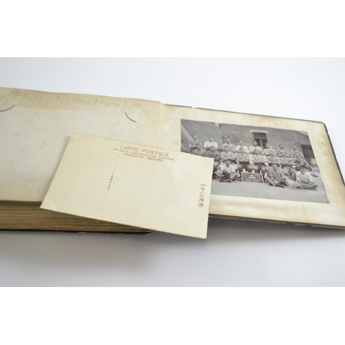 420 - Early C20th Japanese lacquered album containing postcards of Japan, inc. silk printed and hand paint... 