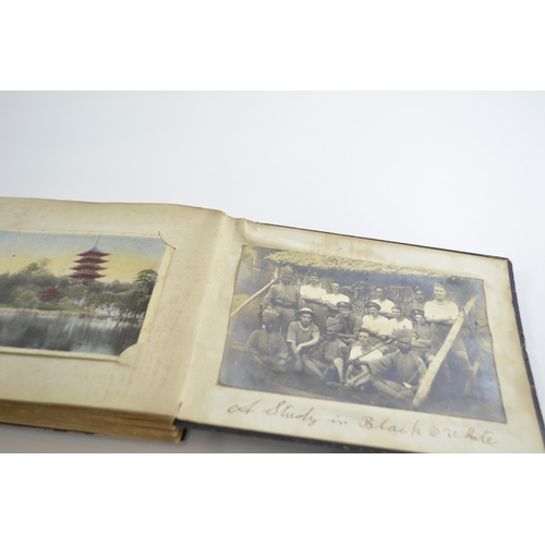 420 - Early C20th Japanese lacquered album containing postcards of Japan, inc. silk printed and hand paint... 