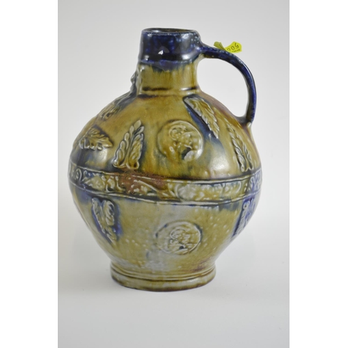 425 - Bellarmine style stoneware jug with majolica style glaze, 20th century impressed 'Plein' to base, he... 