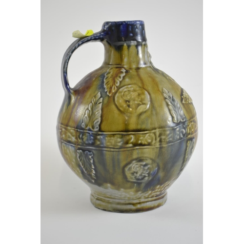 425 - Bellarmine style stoneware jug with majolica style glaze, 20th century impressed 'Plein' to base, he... 