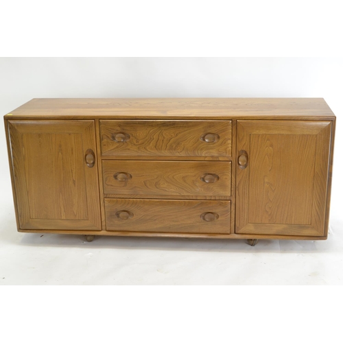 444 - Ercol model 455 Windsor sideboard, in elm. With 3 drawers (inc. cutlery insert) & 2 cupboards. W... 