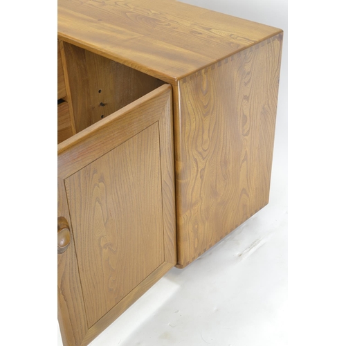 444 - Ercol model 455 Windsor sideboard, in elm. With 3 drawers (inc. cutlery insert) & 2 cupboards. W... 