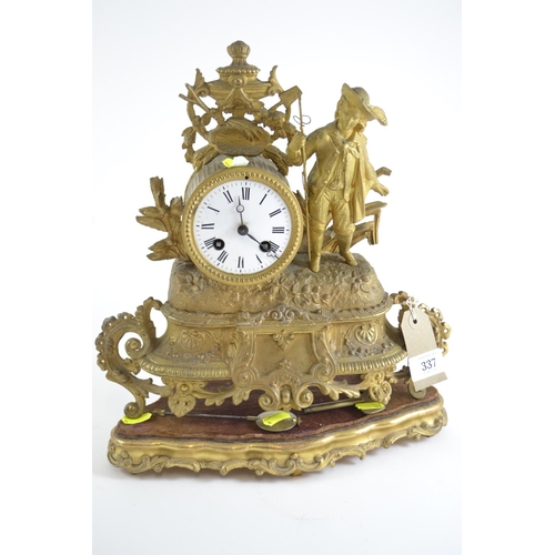 337 - French style figural gilt mantle clock, with stand, pendulum & key, 35cm high including stand