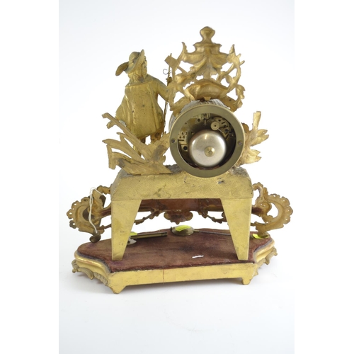 337 - French style figural gilt mantle clock, with stand, pendulum & key, 35cm high including stand