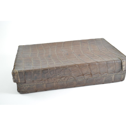 391 - Two small crocodile skin cases, Largest L41cm x D27cm X H10cm