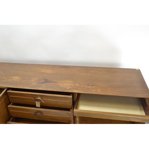 462 - Mid Century Scandart sideboard in elm. 4 drawers & 3 cupboards. L222cm D46cm H73cm