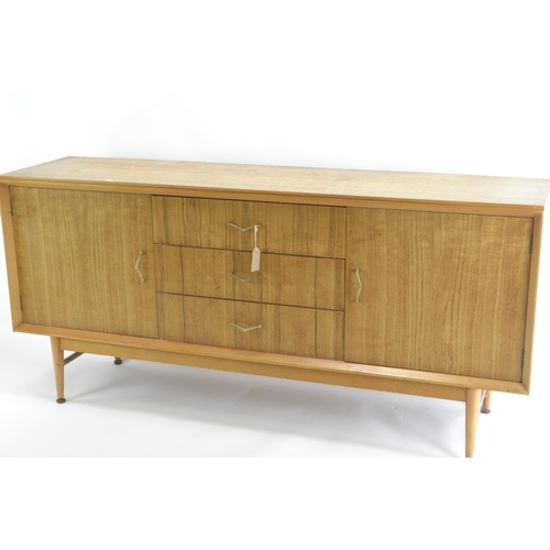 463 - A teak mid-century sideboard by CWS. Comprised of 3 central drawers inc. cutlery drawer, flanked by ... 