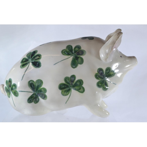 352 - Small Wemyss Ware Shamrock pattern pig, by Robert Heron & Son, impressed marks, 16cm long, with ... 