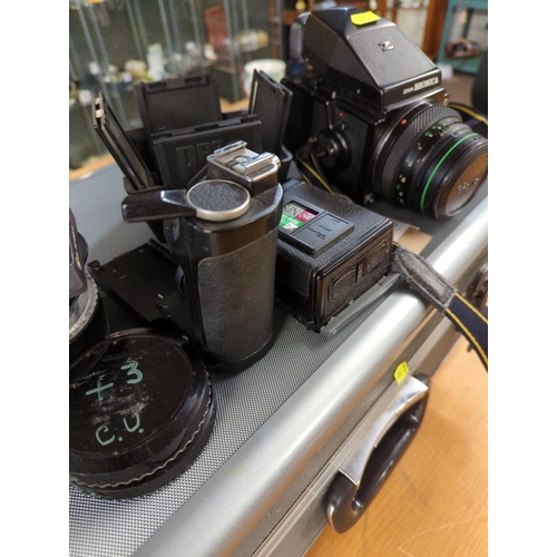 319 - Zenza Bronica ETRS in case with 2 x film backs,  75mm lens and accessories Inc filters Etc