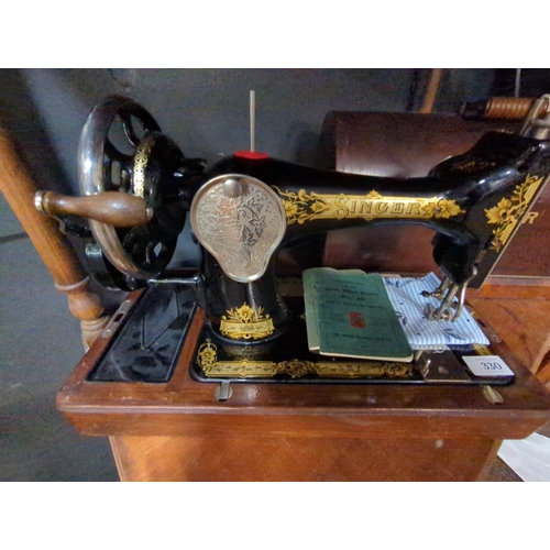 330 - Singer sewing machine No.28 in case with accessories.