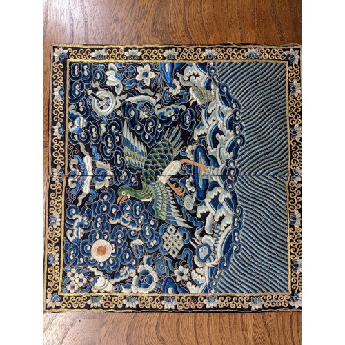 430 - Three Chinese silk embroideries, 30cm x 28xmTwo are sewn together in two halves with a central seam ... 