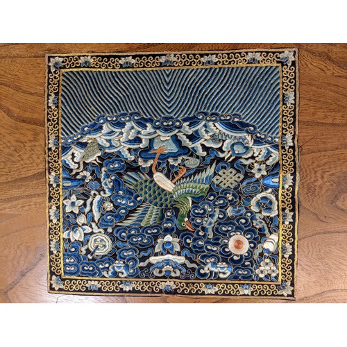 430 - Three Chinese silk embroideries, 30cm x 28xmTwo are sewn together in two halves with a central seam ... 