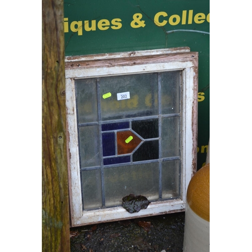 202 - 2 small stained glass window panels. H51cm 43cm