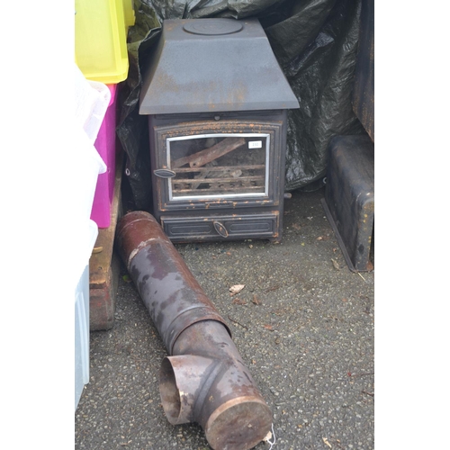 232 - Small single door wood burner. Full service required before domestic use. W46cm H67cm