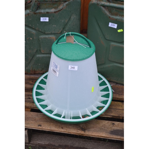 240 - Plastic animal feeder. Appears unused.