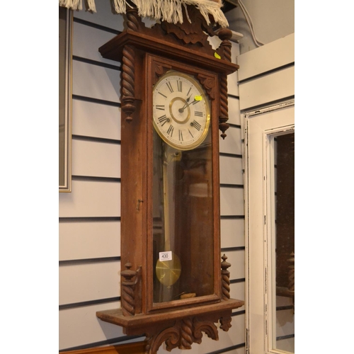 430 - Oak cased Wall clock W38cm D14cm H90cm.
