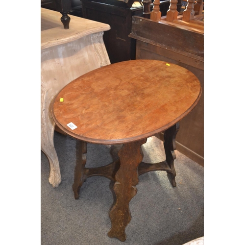 620 - Oval two tier occasional table; 73x54cm H71.5cm