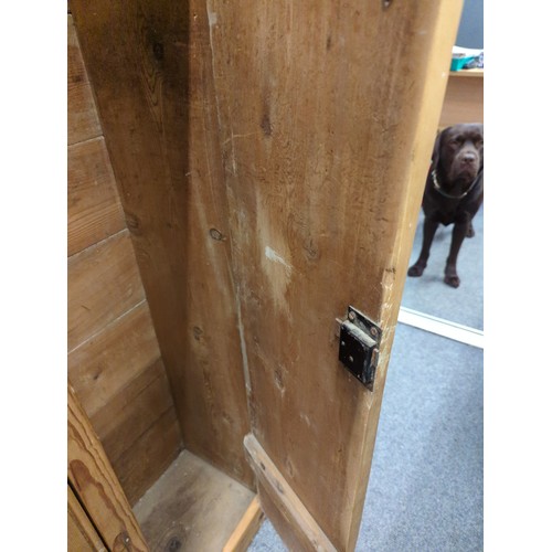 558 - Striped pine locker unit comprising of 7 locker/cupboards W229.5cm D32cm H155cm. Individual cupboard... 
