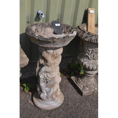 102 - Concrete garden bird bath with foliate support. AF, chipped edge. H72cm