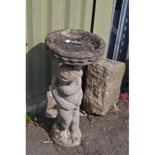 106 - Concrete garden bird bath with cherub support. H77cm