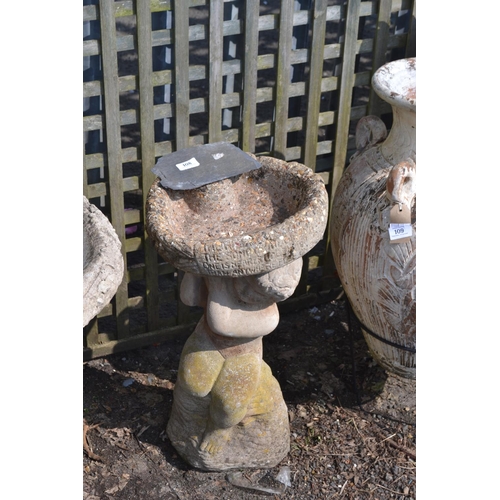 108 - Concrete cherub bird bath. H59cm