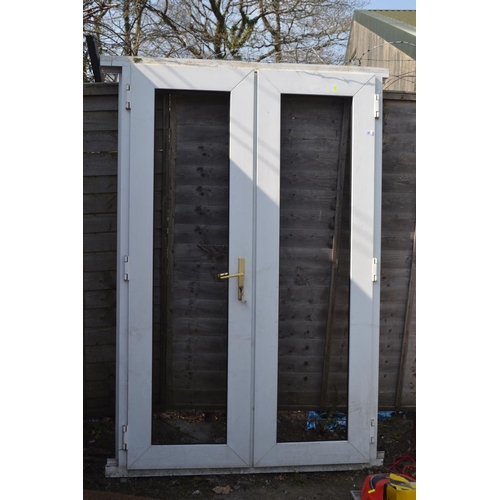 83 - uPVC double door, with key, no glass. W131cm.