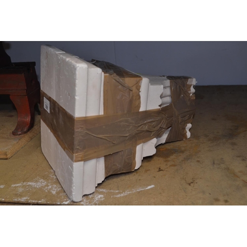 198 - Two plaster corbels