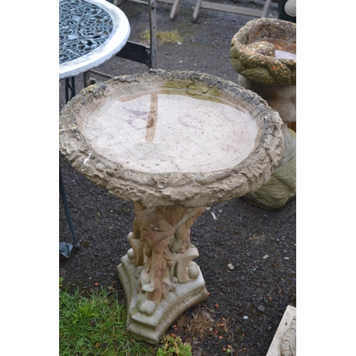 219 - Concrete bird bath with trio of cherub support. H61cm