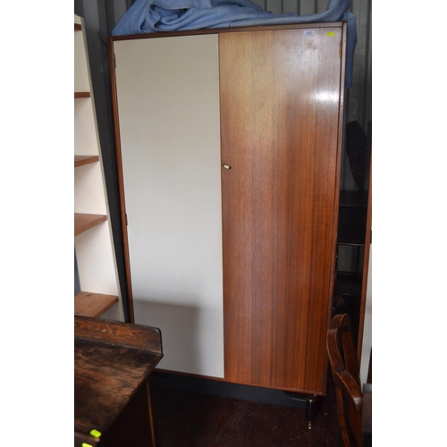 233 - Early 1960's G-Plan Tola range wardrobe, with internal shelves and drawers W91cm x H172cm, includes ... 