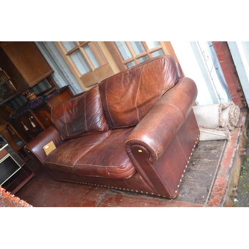 244 - Wade Brown leather sofa with studs to base W203cm