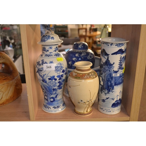 348 - Shelf of oriental ceramics. 