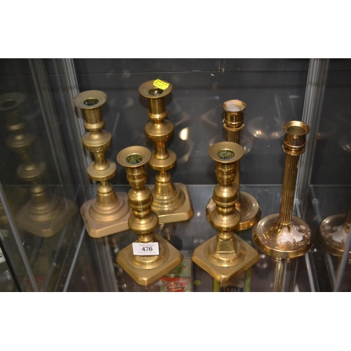 476 - Six brass candlesticks