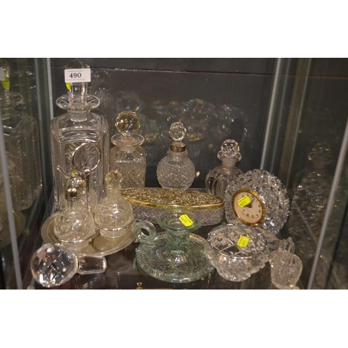 490 - Shelf of cut glass decanters, scent bottles, candlestick etc.