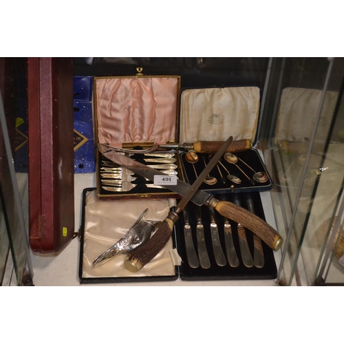 491 - Various cutlery, inc. silver handled butter knives etc