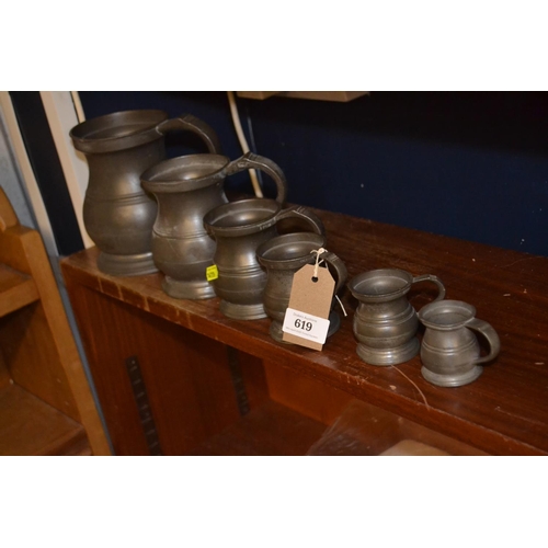 619 - Set of 6 graduated pewter tankards