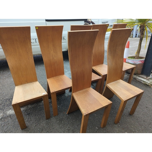 780 - 7 stylish contemporary oak highback dining chairs. H124cm