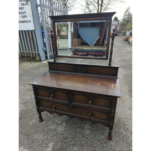 782 - Early c20 oak dresser with mirror back. W107cm d49cm h138cm