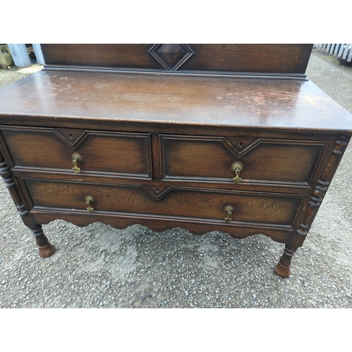 782 - Early c20 oak dresser with mirror back. W107cm d49cm h138cm